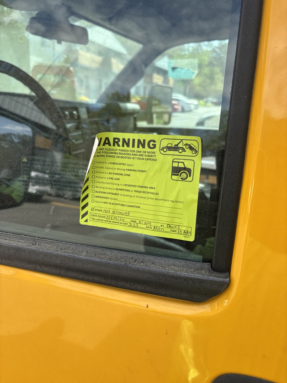 Parking violation warning tag used by S&P Towing